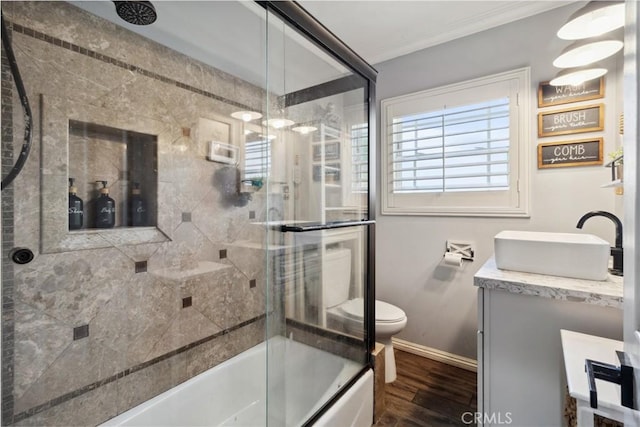 340 N Sunset Ave, West Covina, CA 91790 - full bath featuring vanity, wood finished floors, combined bath / shower with glass door, and crown molding