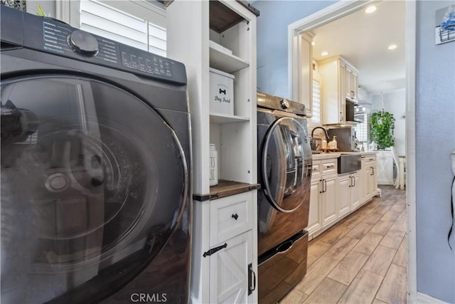 340 N Sunset Ave, West Covina, CA 91790 - laundry area featuring washer / dryer, light wood finished floors, and recessed lighting