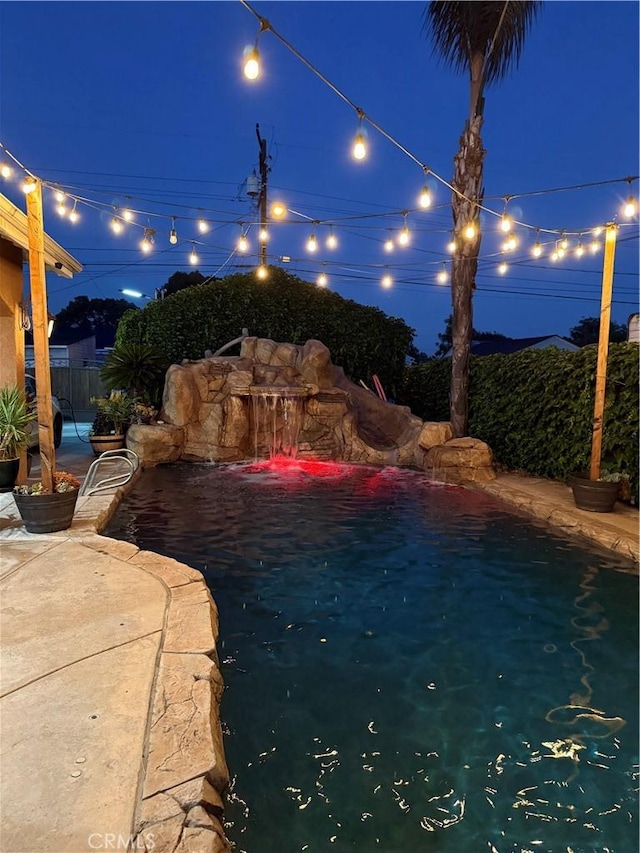 340 N Sunset Ave, West Covina, CA 91790 - pool at night with a patio area