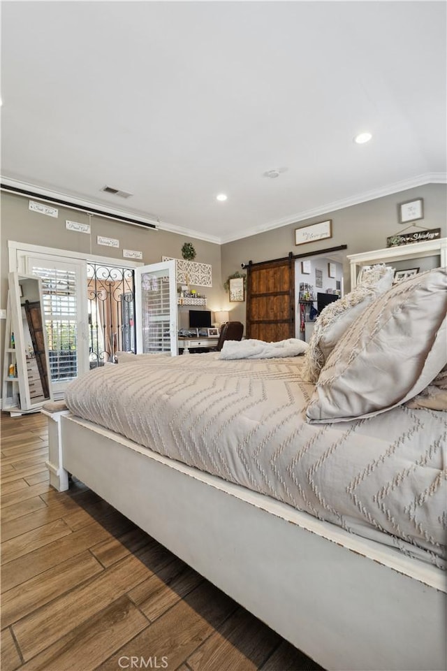 340 N Sunset Ave, West Covina, CA 91790 - bedroom featuring access to exterior, crown molding, wood finished floors, recessed lighting, and a barn door