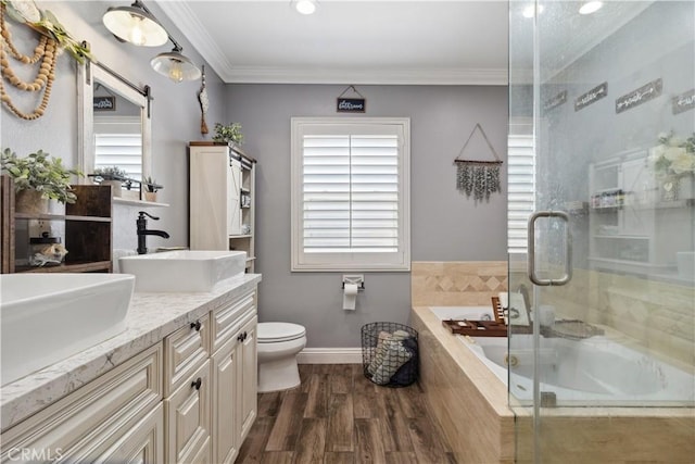 340 N Sunset Ave, West Covina, CA 91790 - bathroom with double vanity, a garden tub, wood finished floors, a shower stall, and crown molding