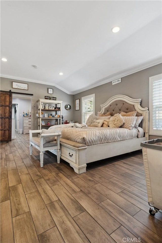 340 N Sunset Ave, West Covina, CA 91790 - bedroom with crown molding, hardwood / wood-style floors, recessed lighting, and a barn door