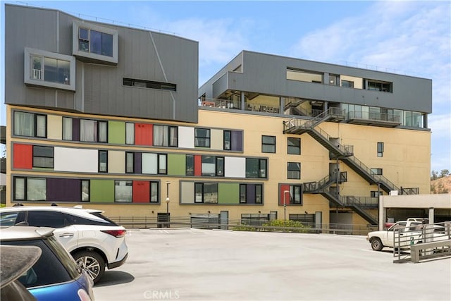200 N San Fernando Rd Unit 202, Los Angeles, CA 90031 - view of apartment building / complex featuring uncovered parking