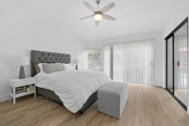 1642 Marbella Dr, Vista, CA 92081 - bedroom with wood finished floors, access to outside, vaulted ceiling, multiple windows, and ceiling fan