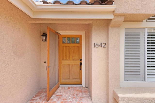 1642 Marbella Dr, Vista, CA 92081 - doorway to property featuring stucco siding