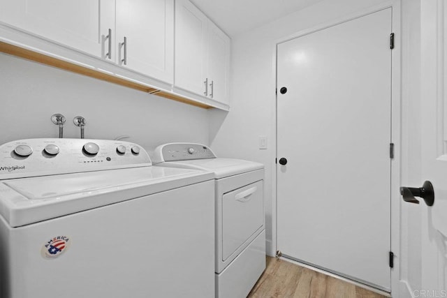1642 Marbella Dr, Vista, CA 92081 - laundry room featuring independent washer and dryer, cabinet space, and light wood-style flooring