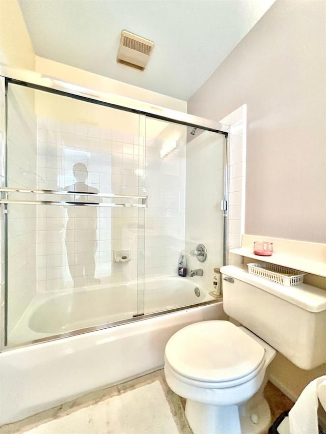 13638 Jadestone Way, San Diego, CA 92130 - bathroom featuring toilet and shower / bath combination with glass door