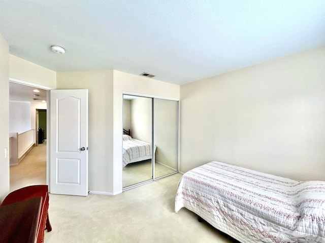 13638 Jadestone Way, San Diego, CA 92130 - carpeted bedroom featuring a closet and baseboards