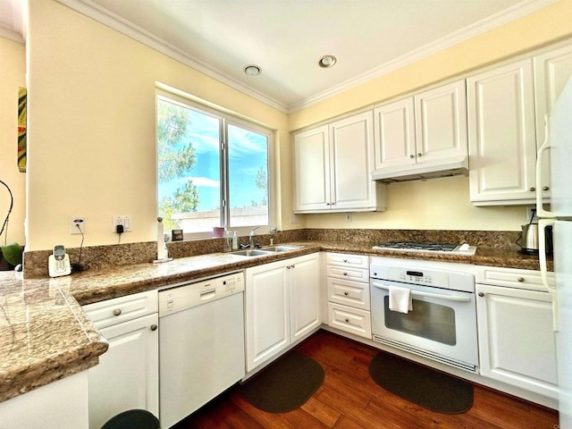 13638 Jadestone Way, San Diego, CA 92130 - kitchen featuring white appliances, ornamental molding, white cabinets, dark wood-style floors, and under cabinet range hood