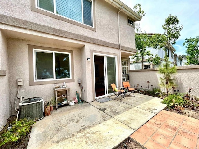 13638 Jadestone Way, San Diego, CA 92130 - doorway to property featuring stucco siding and a patio area