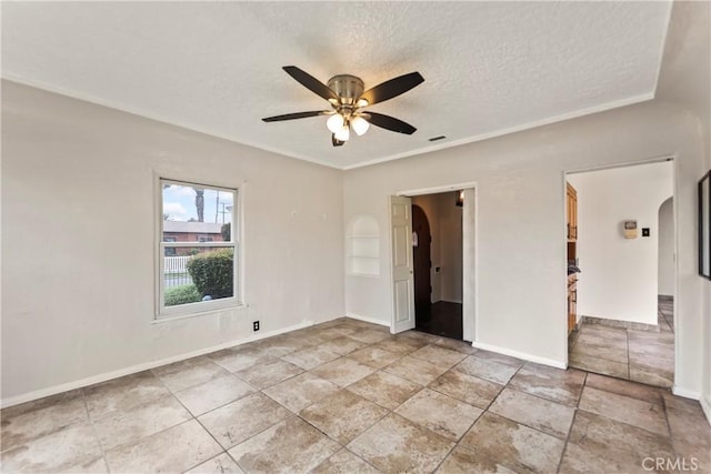621 S Burris Ave, Compton, CA 90221 - empty room featuring a textured ceiling, a ceiling fan, and arched walkways