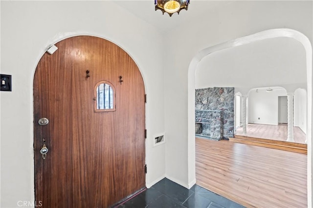 621 S Burris Ave, Compton, CA 90221 - entryway featuring arched walkways and dark tile patterned flooring