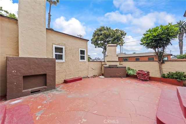 621 S Burris Ave, Compton, CA 90221 - view of patio / terrace featuring an outdoor fireplace