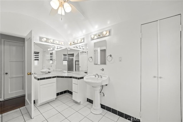 621 S Burris Ave, Compton, CA 90221 - bathroom with a ceiling fan, vaulted ceiling, and tile patterned floors