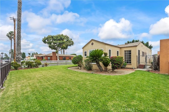 621 S Burris Ave, Compton, CA 90221 - fenced backyard featuring a gate