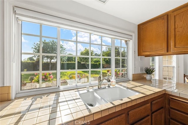 323 N Hacienda Ave, Glendora, CA 91741 - kitchen with tile countertops and brown cabinets