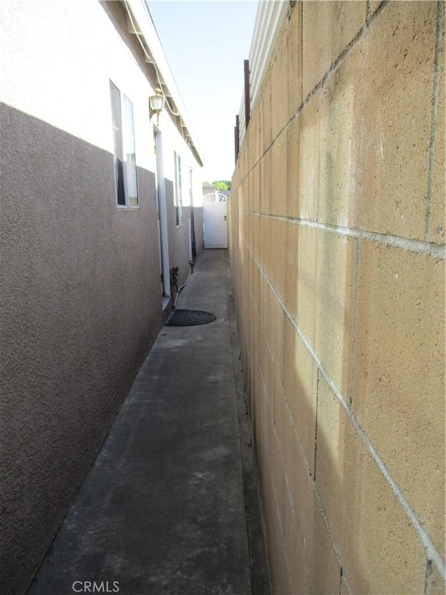 2713 E Monroe St, Long Beach, CA 90810 - view of side of property featuring stucco siding