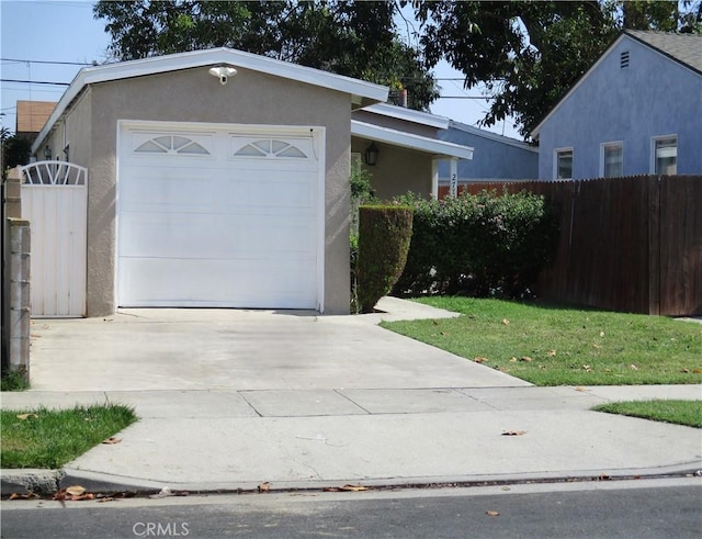2713 E Monroe St, Long Beach, CA 90810 - ranch-style home with stucco siding, concrete driveway, and a garage