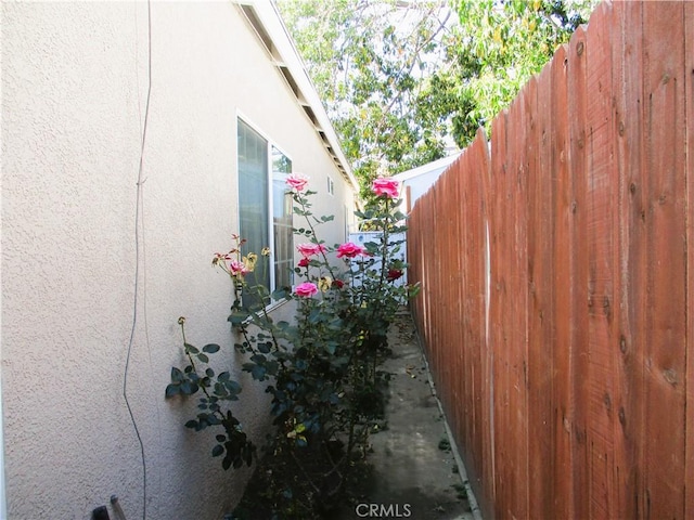 2713 E Monroe St, Long Beach, CA 90810 - view of side of home featuring stucco siding