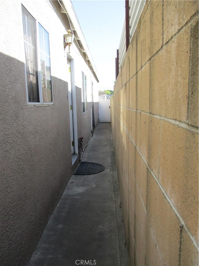 2713 E Monroe St, Long Beach, CA 90810 - view of side of property with stucco siding