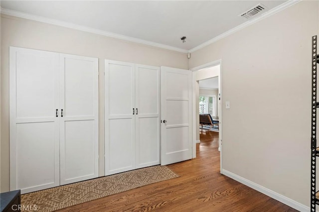 4514 Cedros Ave, Sherman Oaks, CA 91403 - unfurnished bedroom with light wood-style flooring and crown molding