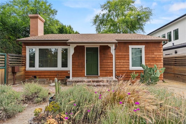 4514 Cedros Ave, Sherman Oaks, CA 91403 - view of front of home with a chimney and a shingled roof