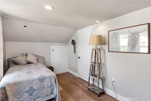 402 E St, Orland, CA 95963 - bedroom with lofted ceiling, wood finished floors, and recessed lighting