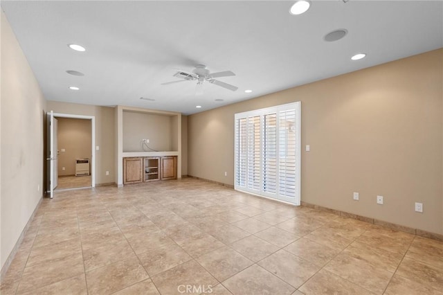 58960 Delano Trl, Yucca Valley, CA 92284 - unfurnished living room featuring a ceiling fan, recessed lighting, and light tile patterned floors