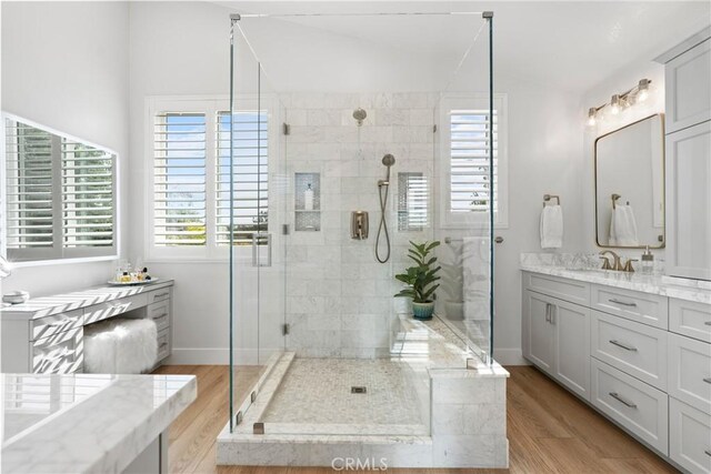 27811 Bloomfield Ct, Valencia, CA 91354 - bathroom with a stall shower, vanity, and wood finished floors