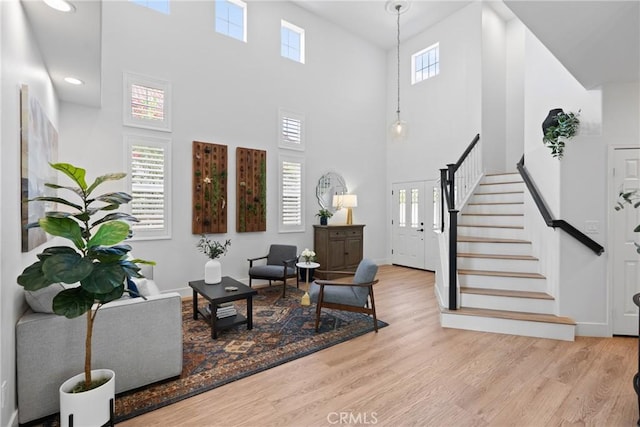 27811 Bloomfield Ct, Valencia, CA 91354 - entrance foyer featuring a towering ceiling, wood finished floors, stairs, and healthy amount of natural light