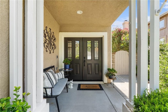27811 Bloomfield Ct, Valencia, CA 91354 - property entrance featuring stucco siding and french doors