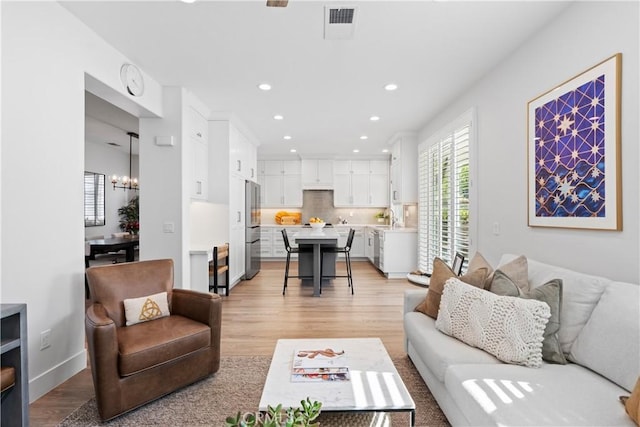 27811 Bloomfield Ct, Valencia, CA 91354 - living area featuring recessed lighting and light wood-style flooring