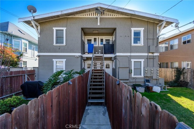 1517 E 1st St, Long Beach, CA 90802 - view of front facade with stairs and a fenced backyard