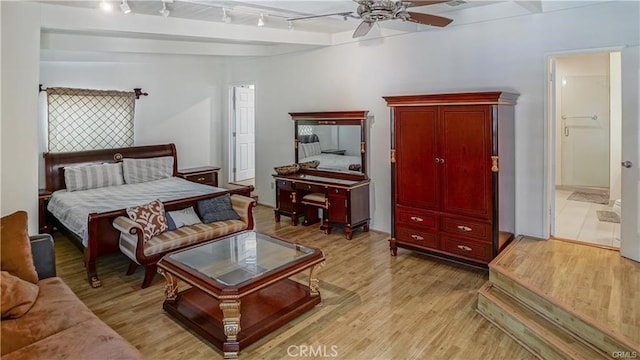 6418 Whitman Ave, Van Nuys, CA 91406 - bedroom with track lighting, light wood-style flooring, and a ceiling fan