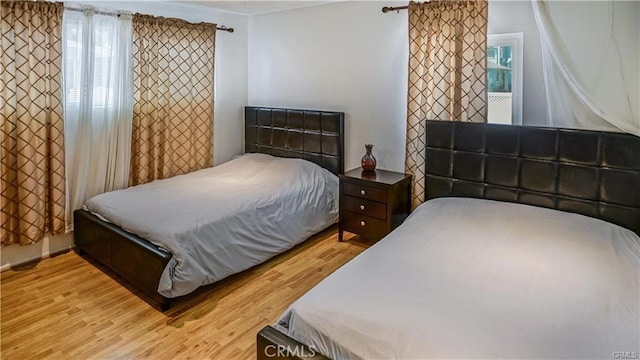 6418 Whitman Ave, Van Nuys, CA 91406 - bedroom with light wood-style floors