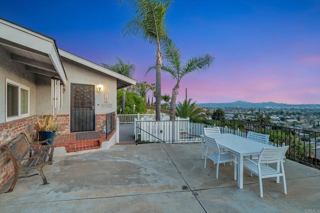 1106 Dawnridge Ave, El Cajon, CA 92021 - patio terrace at dusk featuring outdoor dining area and a patio
