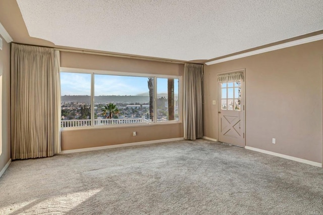 1106 Dawnridge Ave, El Cajon, CA 92021 - spare room with a textured ceiling, carpet, and crown molding