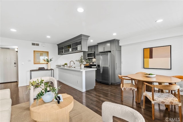 2700 Cahuenga Blvd E Unit 3104, Los Angeles, CA 90068 - living room with dark wood-style flooring and recessed lighting