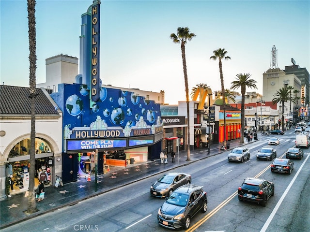 2700 Cahuenga Blvd E Unit 3104, Los Angeles, CA 90068 - view of asphalt road featuring street lights, curbs, and sidewalks