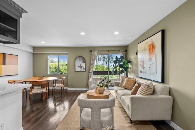 2700 Cahuenga Blvd E Unit 3104, Los Angeles, CA 90068 - living area featuring dark wood-style floors, recessed lighting, and plenty of natural light