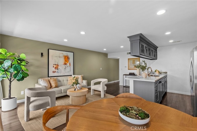 2700 Cahuenga Blvd E Unit 3104, Los Angeles, CA 90068 - dining area with recessed lighting and dark wood-style floors
