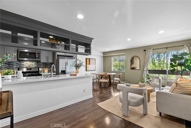2700 Cahuenga Blvd E Unit 3104, Los Angeles, CA 90068 - living area featuring dark wood-style flooring and recessed lighting