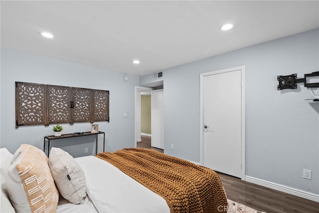 2700 Cahuenga Blvd E Unit 3104, Los Angeles, CA 90068 - bedroom with dark wood-type flooring and recessed lighting