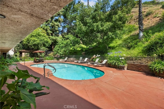 2700 Cahuenga Blvd E Unit 3104, Los Angeles, CA 90068 - community pool featuring a patio and a fenced backyard
