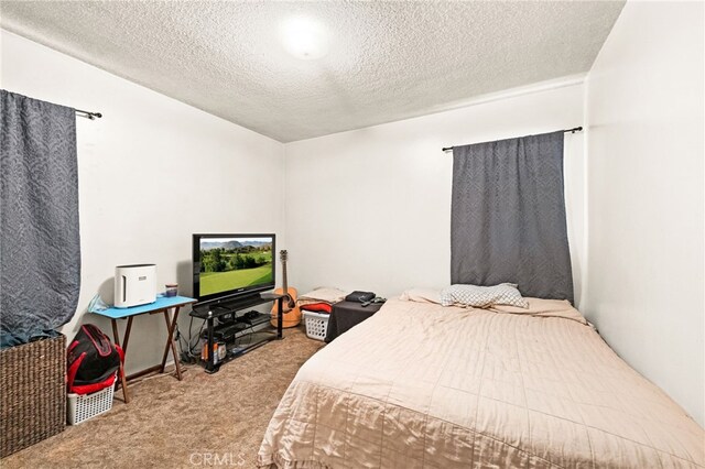 3551 Brynhurst Dr, Riverside, CA 92504 - carpeted bedroom with a textured ceiling
