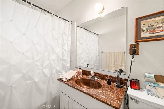 3551 Brynhurst Dr, Riverside, CA 92504 - bathroom with vanity and a shower with curtain