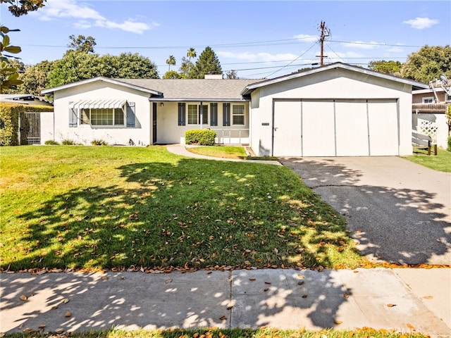 3551 Brynhurst Dr, Riverside, CA 92504 - ranch-style house with asphalt driveway, a garage, stucco siding, and roof with shingles