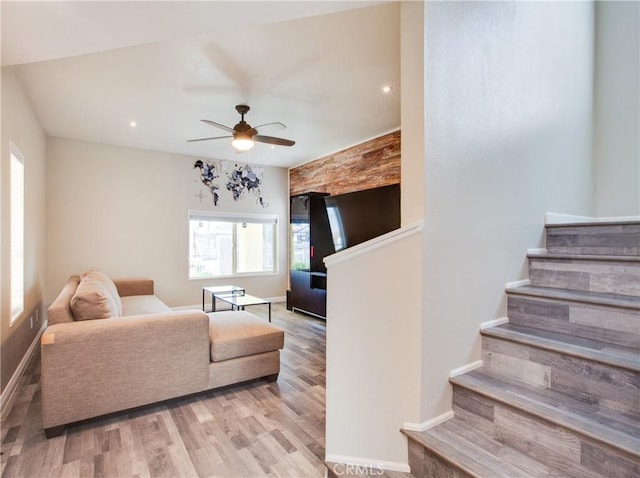 10105 S Main St, Los Angeles, CA 90003 - living room featuring plenty of natural light, stairs, wood finished floors, a ceiling fan, and recessed lighting