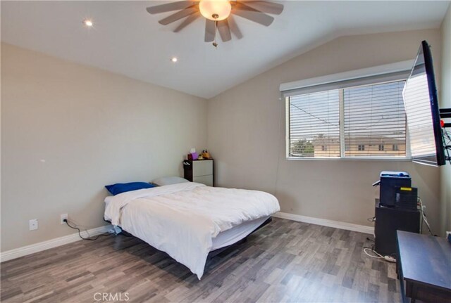 10105 S Main St, Los Angeles, CA 90003 - bedroom with wood finished floors, lofted ceiling, ceiling fan, and recessed lighting