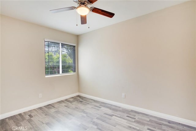 10105 S Main St, Los Angeles, CA 90003 - unfurnished room featuring light wood-style flooring and a ceiling fan